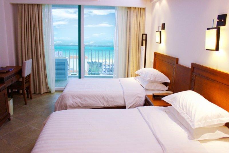 Haiyue Bay Holiday Hotel Санья Номер фото